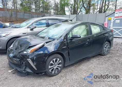 2021 Toyota Prius Le from USA, damaged, VIN JTDL9MFU8M3029870